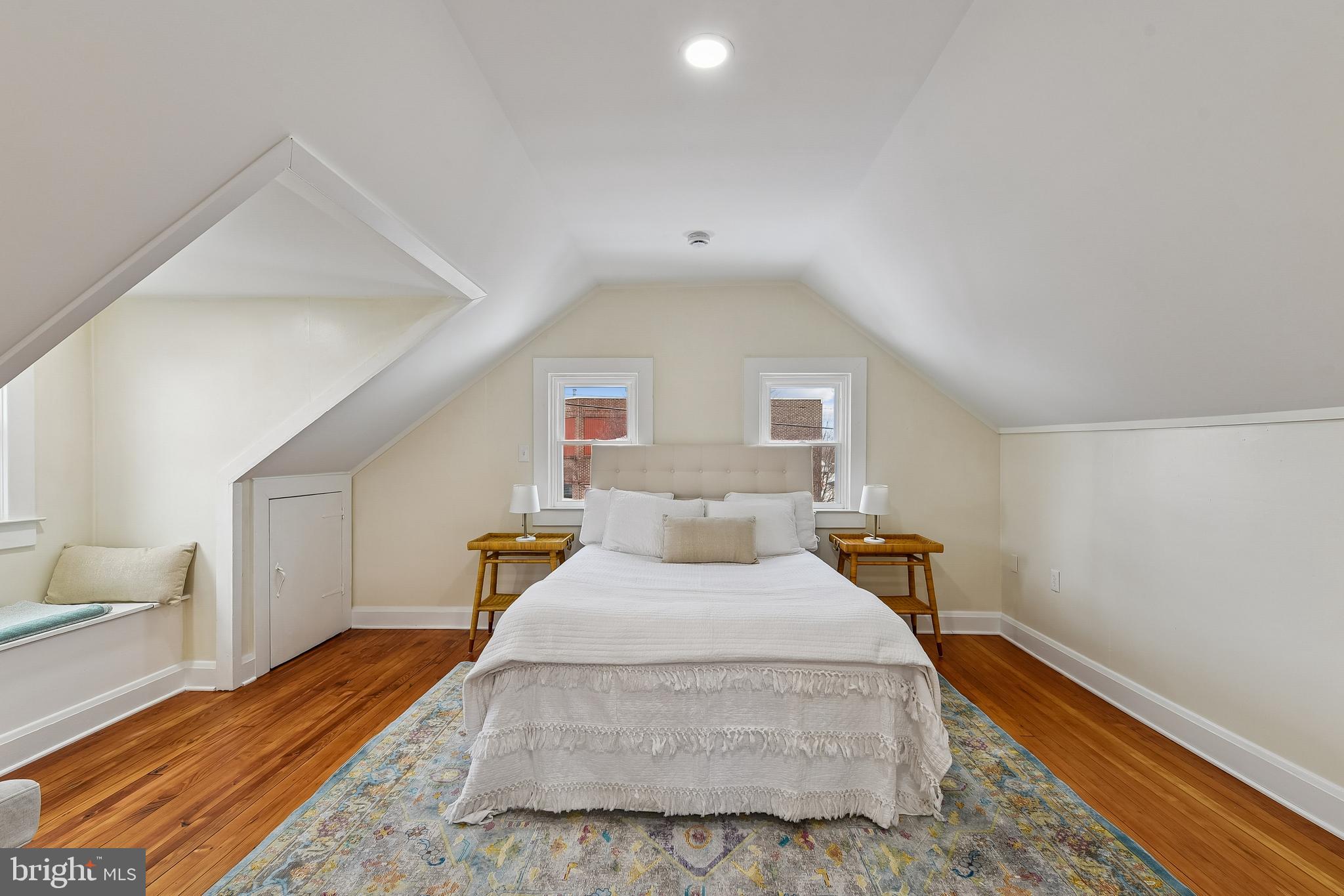 100 Margaret Avenue Baltimore, MD 21221 - Photo 25 of 44 a bedroom with a bed and wooden floor