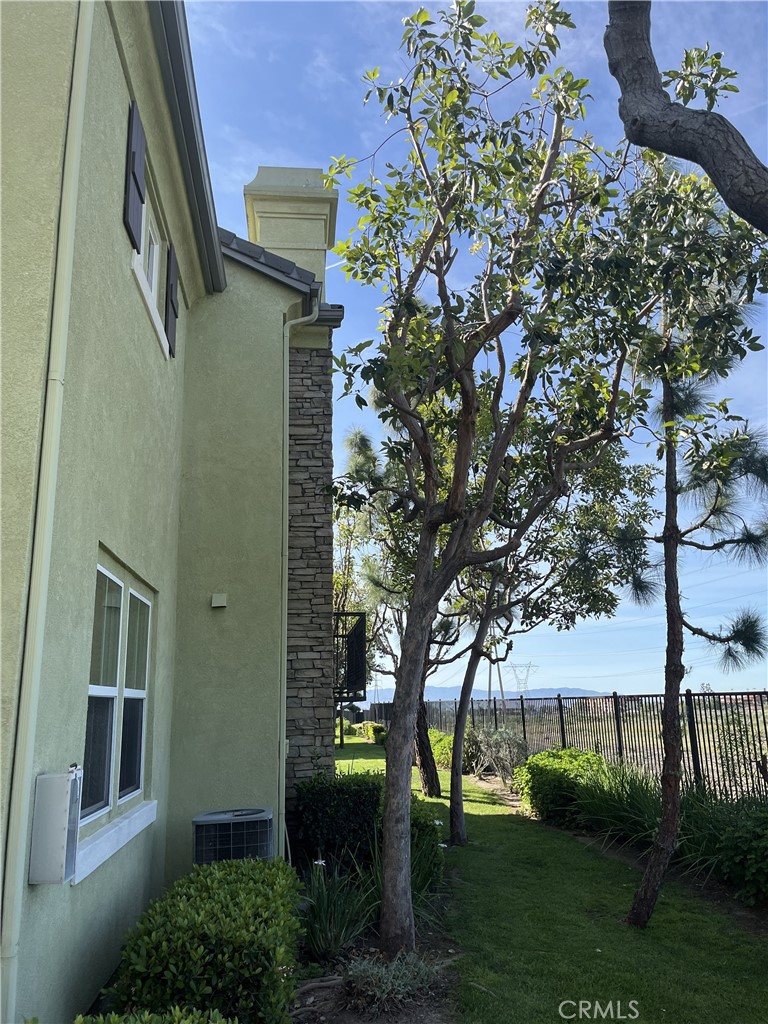 7744 Chambray Place, Unit 3 Rancho Cucamonga, CA 91739 - Photo 51 of 53 Side view of house