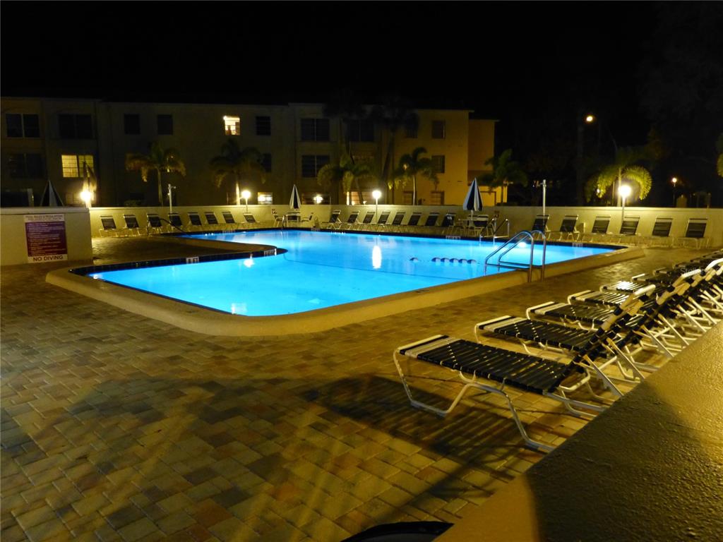 2700 Bayshore Boulevard, Unit 11105 Dunedin, FL 34698 - Photo 19 of 33 a view of a swimming pool with an outdoor space
