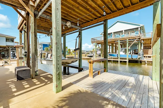 a view of a patio with swimming pool table and chairs