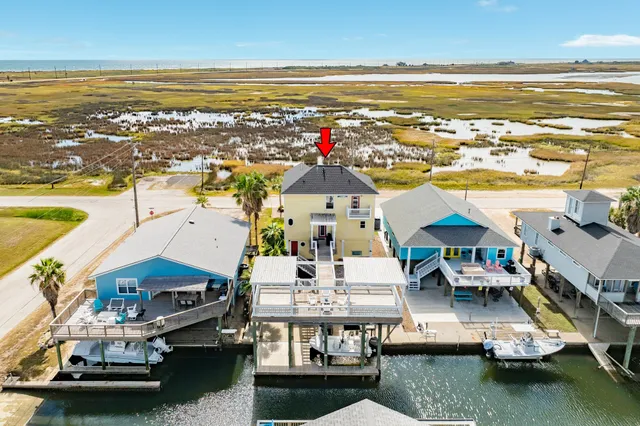 a view of a balcony with chairs