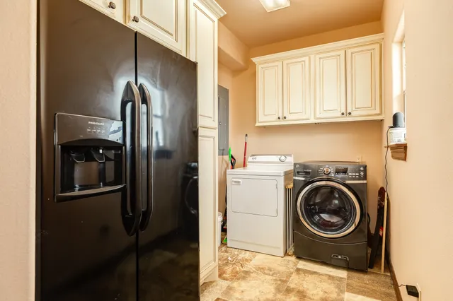 a view of a hallway with a chandelier