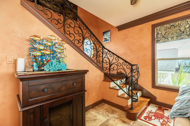 a view of balcony with two chairs and a table