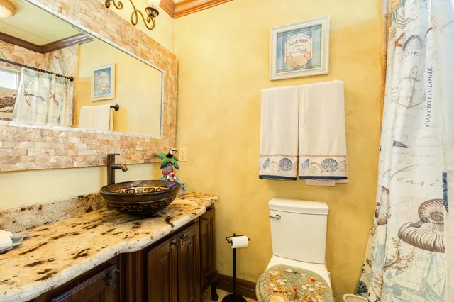 a view of a swimming pool with a patio