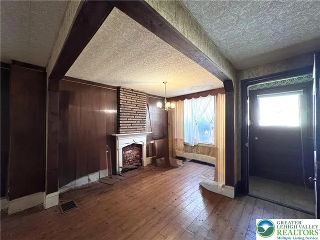 wooden floor and windows in an empty room