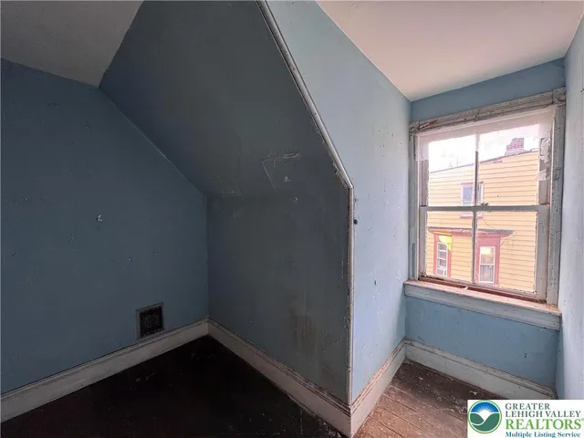 a house with trees in front of it