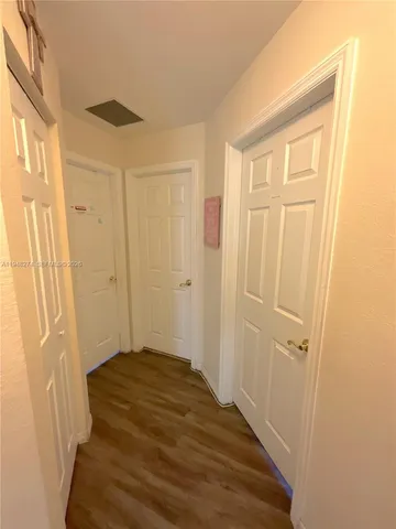 a bedroom with bed and window