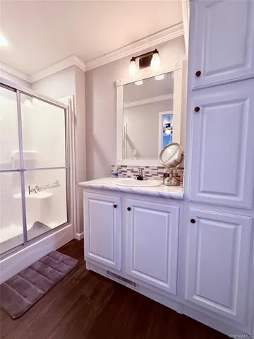 a bathroom with a sink and a mirror