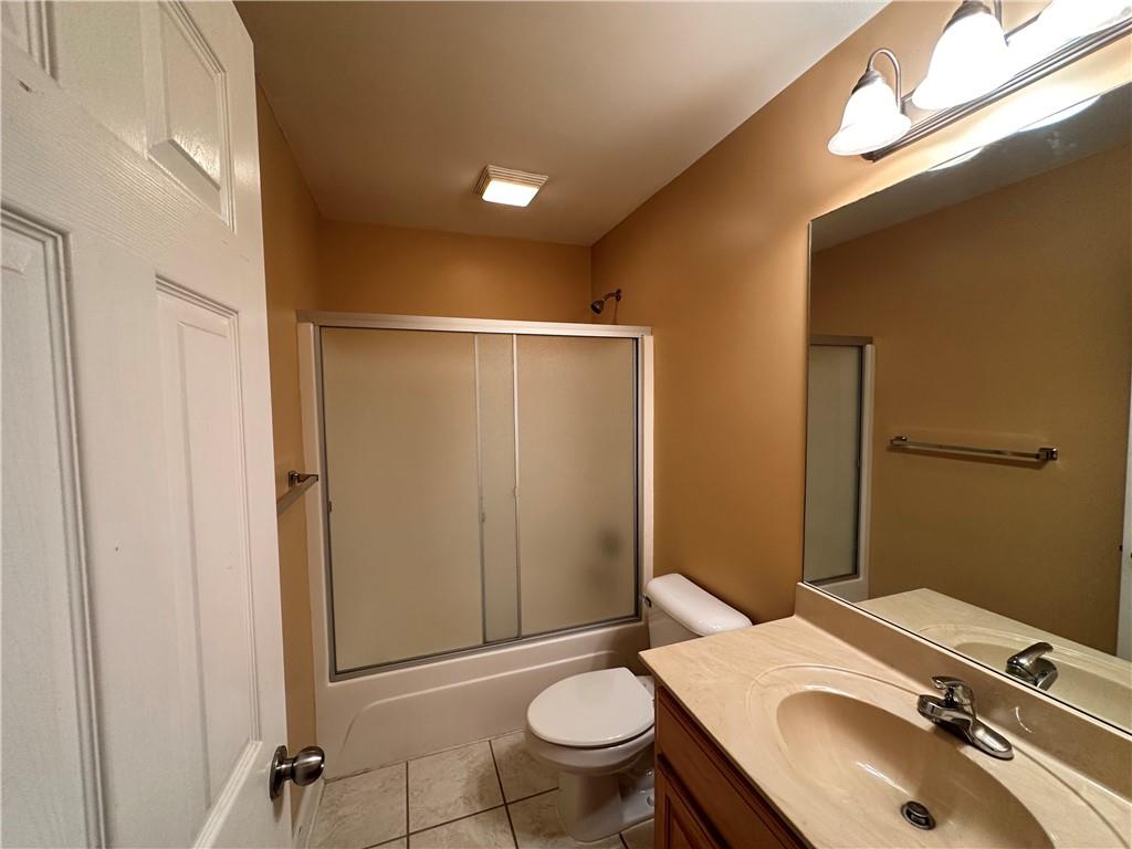 105 Whitehead Road, Unit 10 Athens, GA 30606 - Photo 12 of 16 a bathroom with a sink toilet and shower