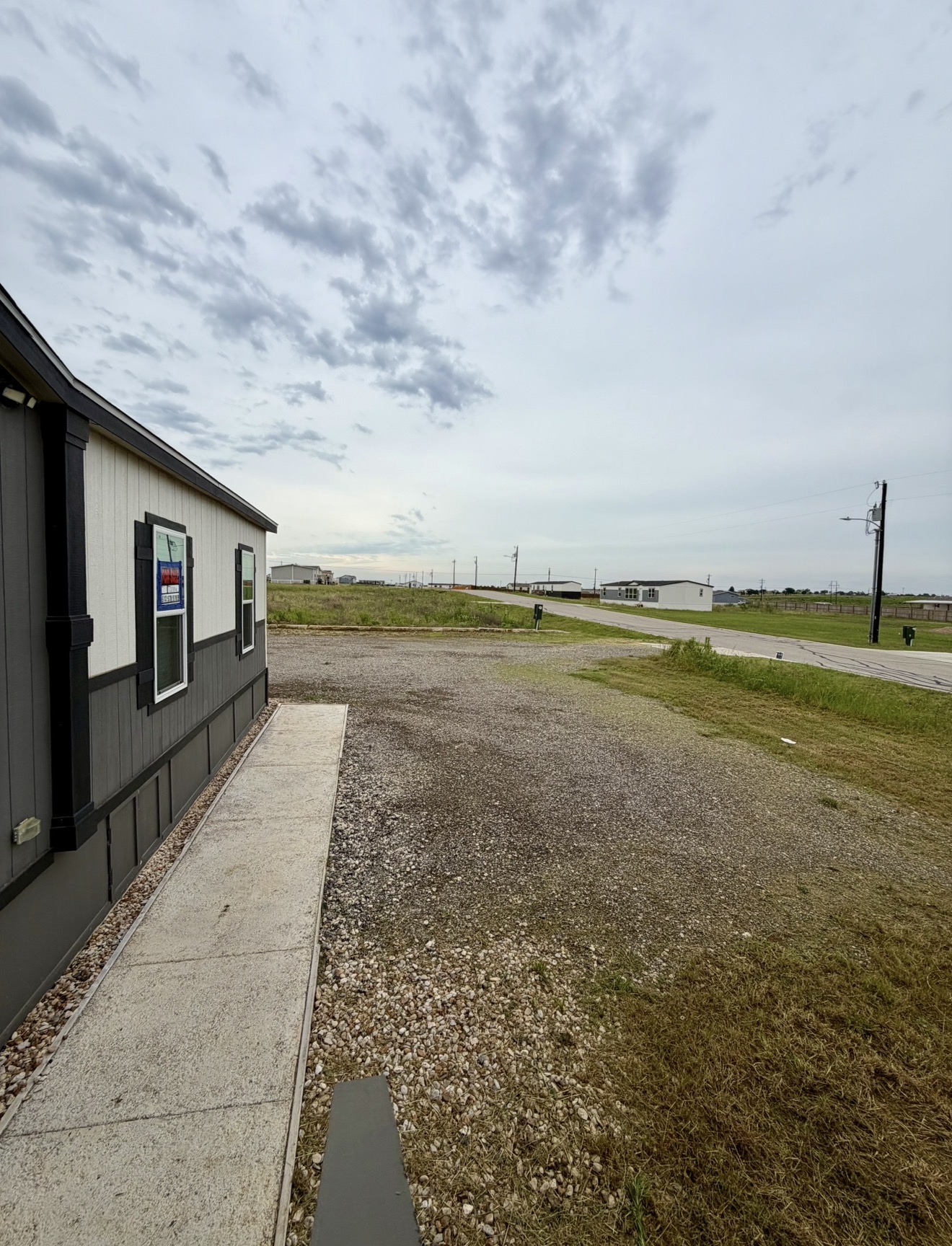 126 Castellana Way Elgin, TX 78621 - Photo 6 of 19 a view of an ocean & house
