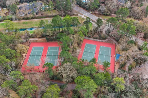 a view of a backyard with chairs