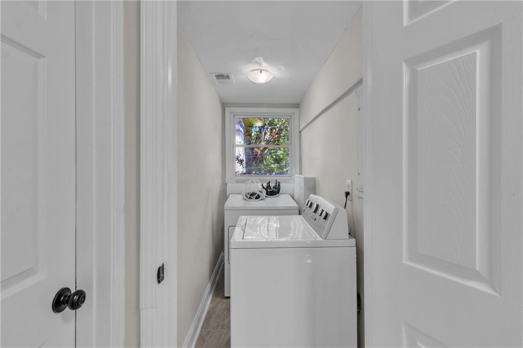 2363 Oakridge Court Decatur, GA 30032 - Photo 18 of 32 a utility room with dryer and washer