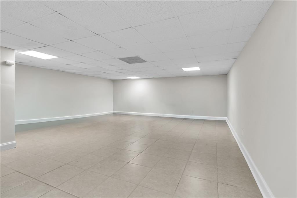 2363 Oakridge Court Decatur, GA 30032 - Photo 19 of 32 an empty room with a empty space and windows