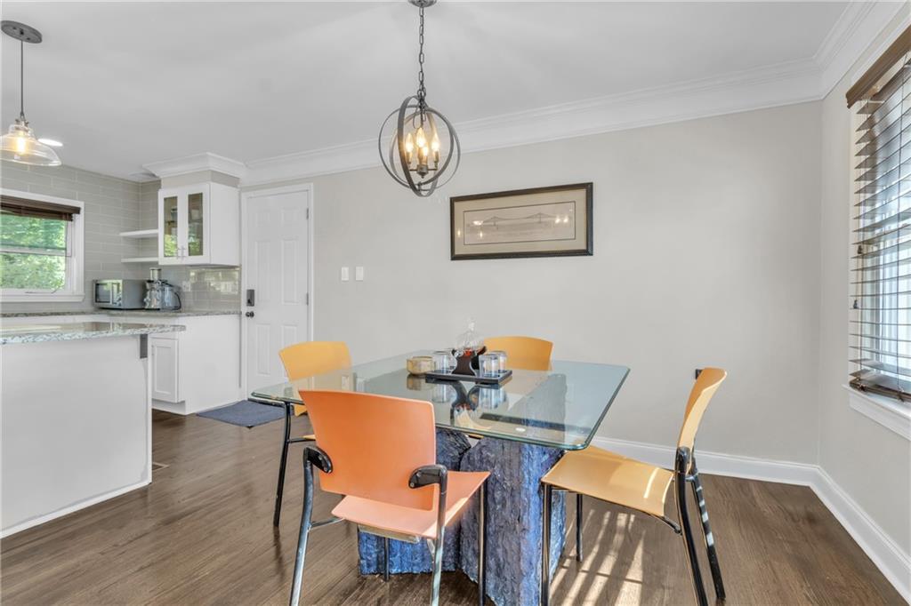 2363 Oakridge Court Decatur, GA 30032 - Photo 2 of 32 a dining room with wooden floor and windows