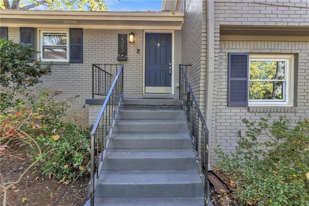 2363 Oakridge Court Decatur, GA 30032 - Photo 21 of 32 a view of wooden house with a door and windows