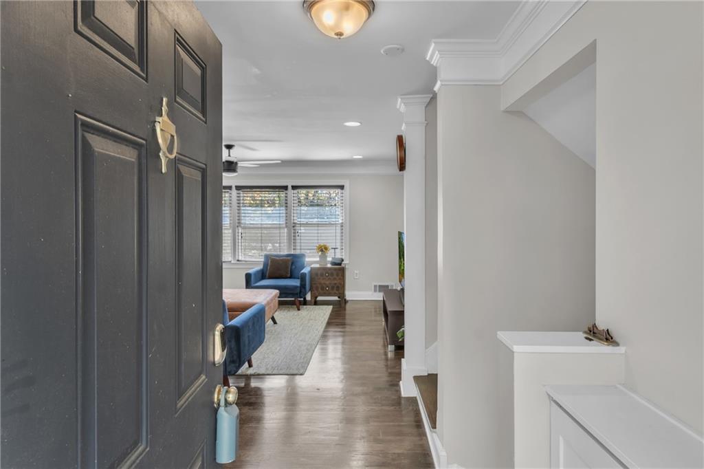 2363 Oakridge Court Decatur, GA 30032 - Photo 23 of 32 a view of a hallway with couch and chairs