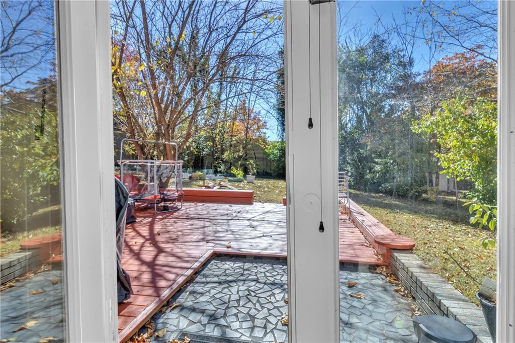 2363 Oakridge Court Decatur, GA 30032 - Photo 26 of 32 a view of a pathway with a bench in backyard
