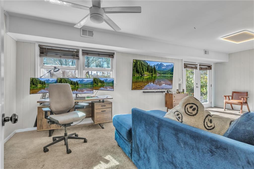 2363 Oakridge Court Decatur, GA 30032 - Photo 6 of 32 a view of a workspace with furniture and a window