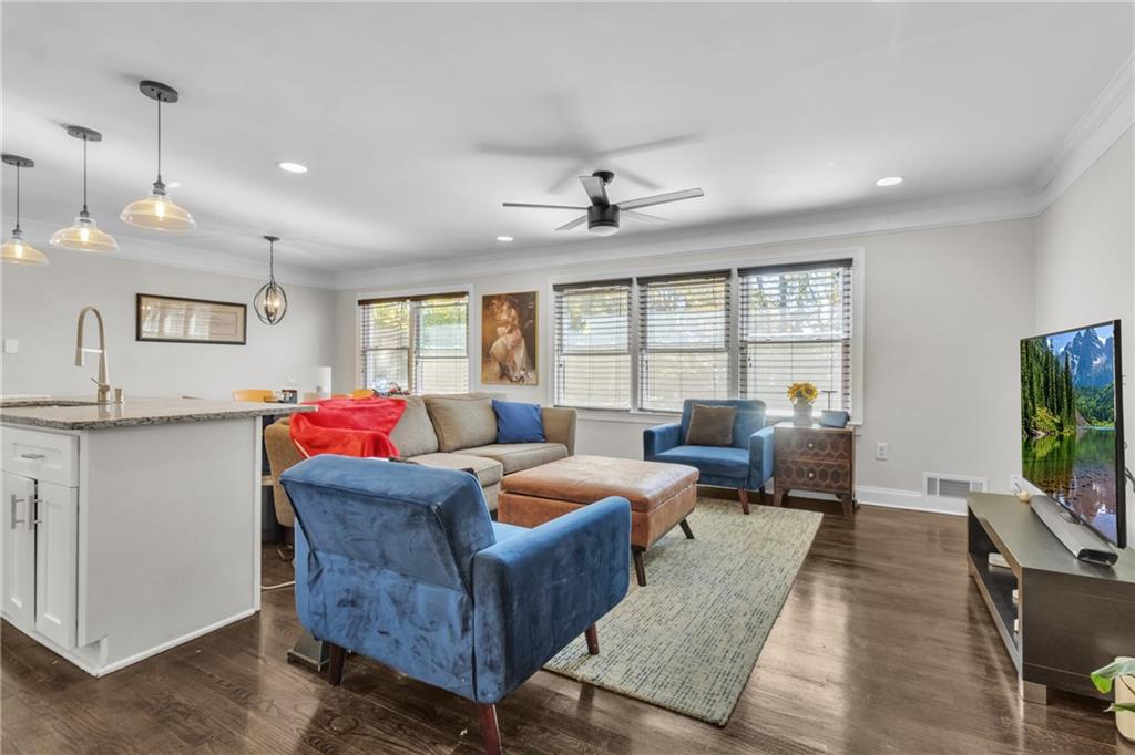 2363 Oakridge Court Decatur, GA 30032 - Photo 8 of 32 a living room with furniture and a flat screen tv