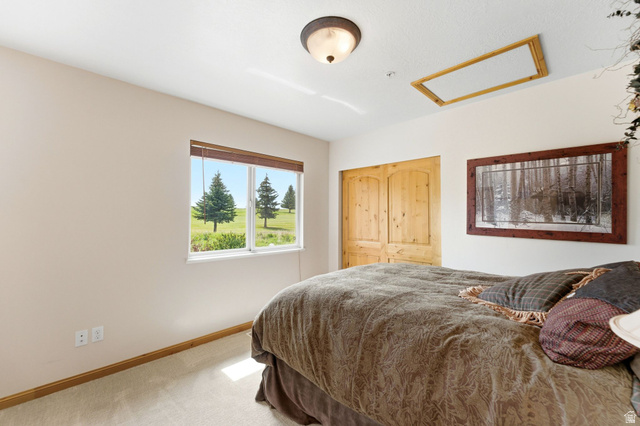 3634 North Huntsman Path, Unit C203 Eden, UT 84310 - Photo 13 of 27 Double window framing a pastoral landscape