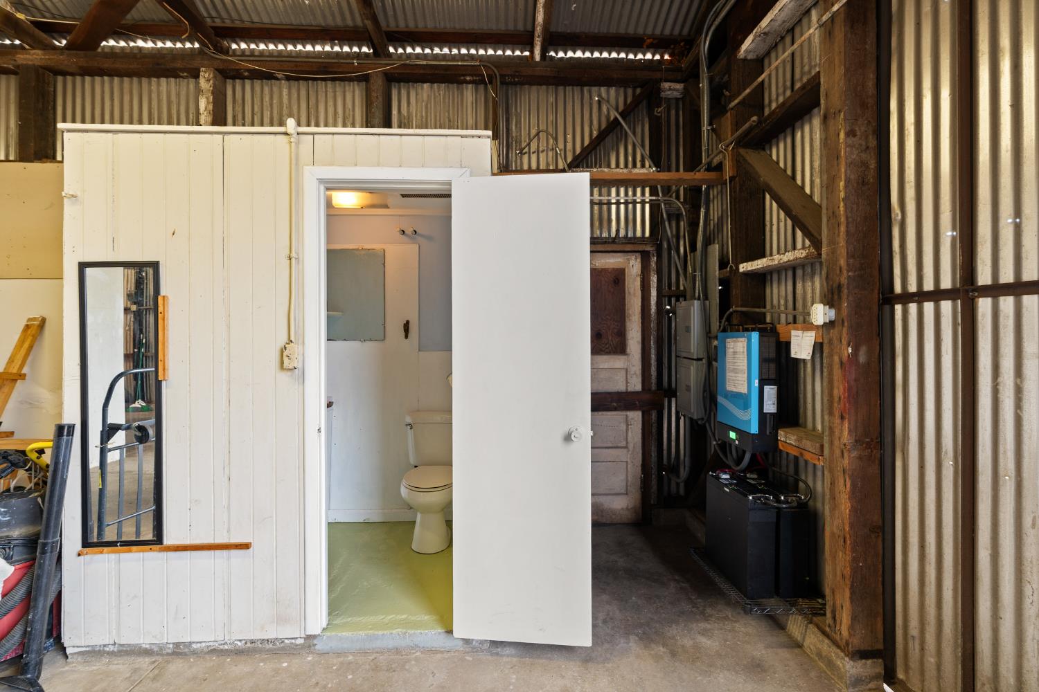 5610 North Confer Road Stockton, CA 95215 - Photo 14 of 40 Workshop half bath, solar batteries x2.