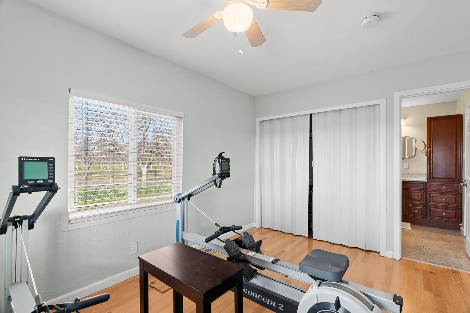 5610 North Confer Road Stockton, CA 95215 - Photo 19 of 40 Bedroom 1, closet, window, access to full bathroom