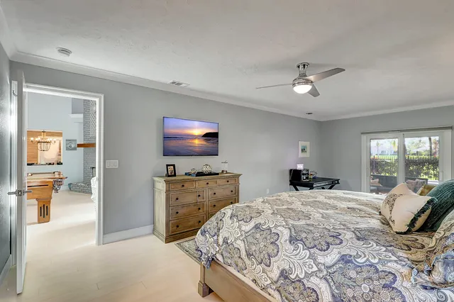 a dining room with a table and chairs