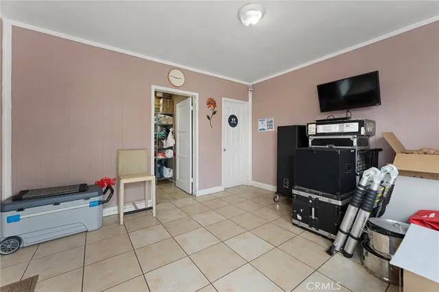 a room with furniture and a flat screen tv