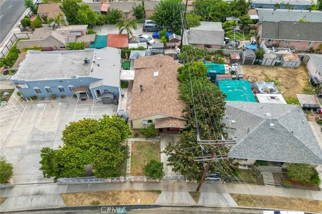 an aerial view of a house with outdoor space