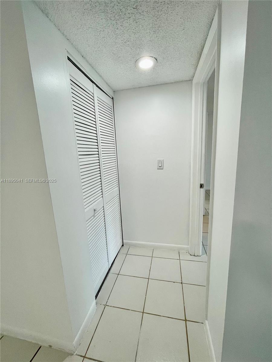 2209 South Cypress Bend Drive, Unit 407 Pompano Beach, FL 33069 - Photo 24 of 53 a view of an empty room
