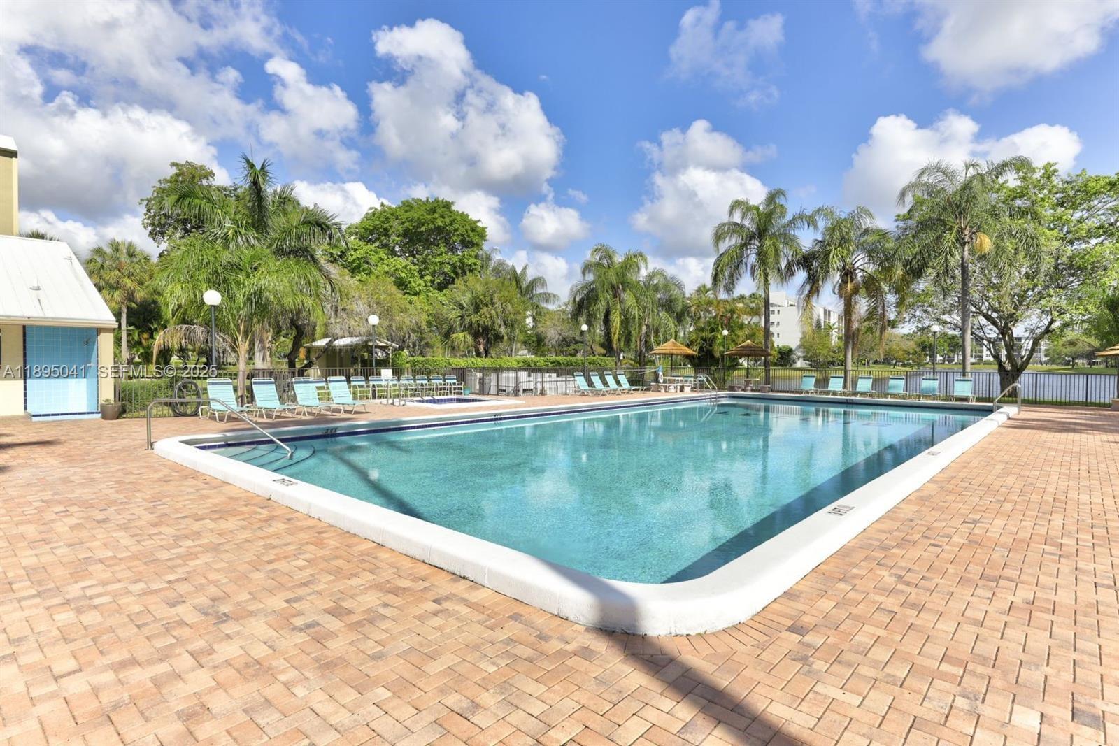 2209 South Cypress Bend Drive, Unit 407 Pompano Beach, FL 33069 - Photo 33 of 53 Main Le Club Pool