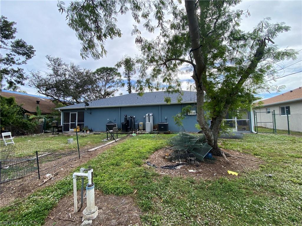 7319 Albany Road Fort Myers, FL 33967 - Photo 22 of 47 a house view with a backyard space