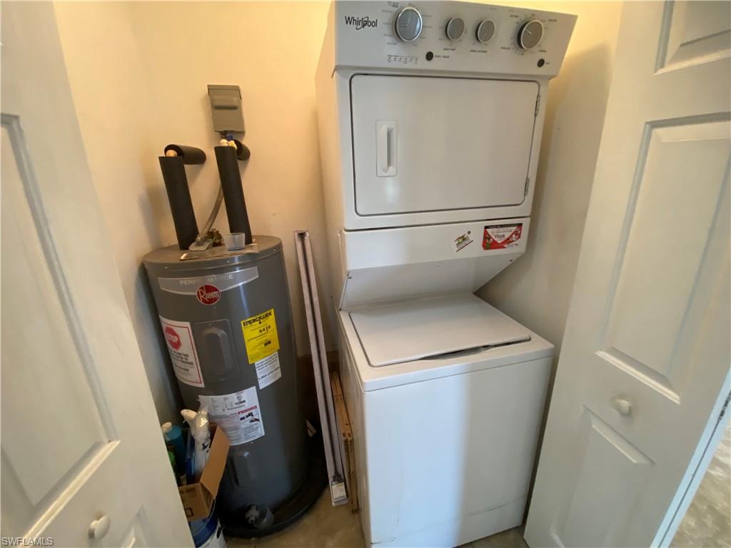 7319 Albany Road Fort Myers, FL 33967 - Photo 24 of 47 a utility room with dryer and washer