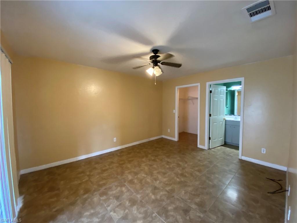 7319 Albany Road Fort Myers, FL 33967 - Photo 27 of 47 a view of empty room with fan