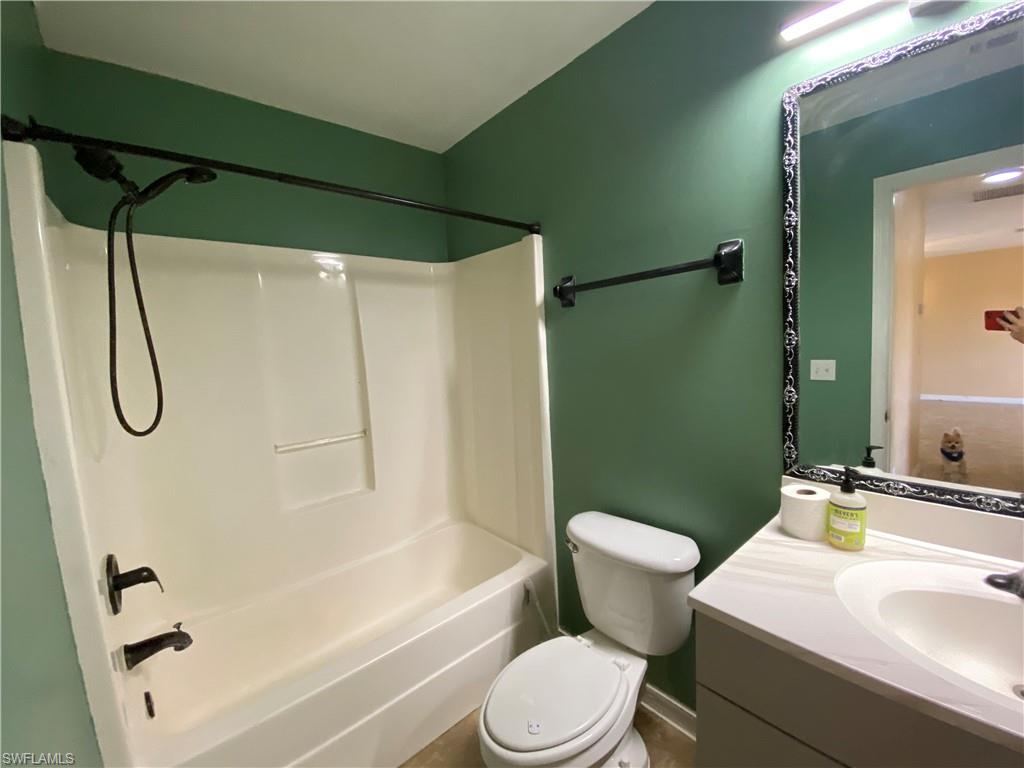 7319 Albany Road Fort Myers, FL 33967 - Photo 35 of 47 a bathroom with a sink toilet and shower