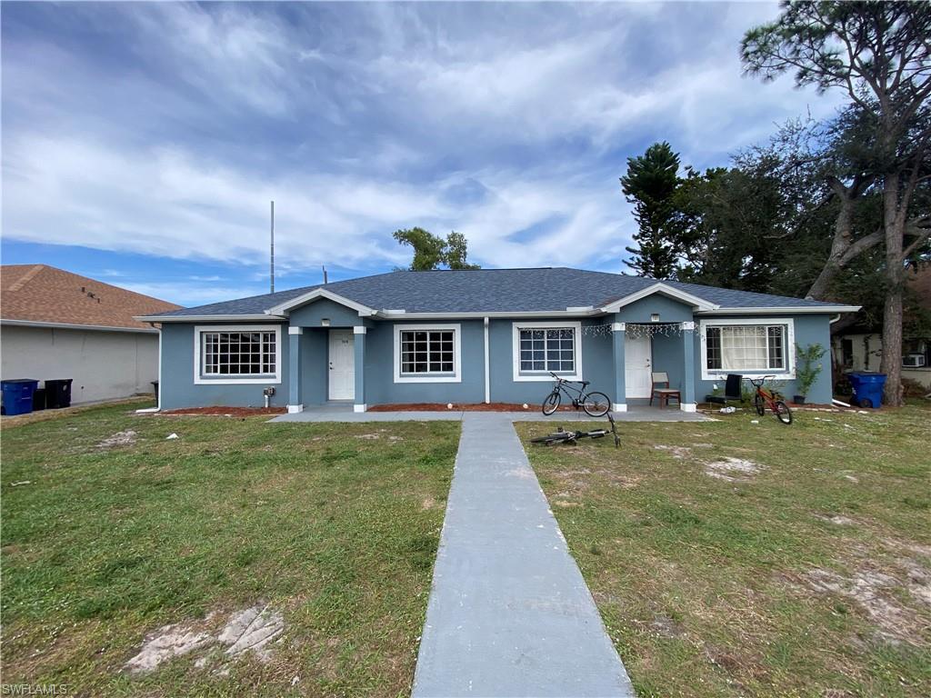 7319 Albany Road Fort Myers, FL 33967 - Photo 44 of 47 a front view of a house with yard porch and furniture