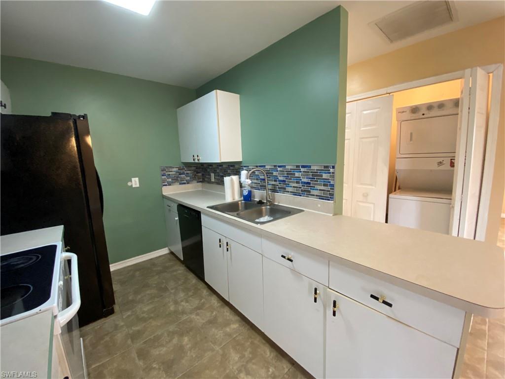 7319 Albany Road Fort Myers, FL 33967 - Photo 47 of 47 a bathroom with a sink and a mirror