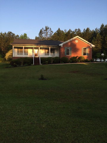 517 Hamlin Road, Unit TRACT Jackson, GA 30233 - Photo 21 of 44 a front view of a house with a garden