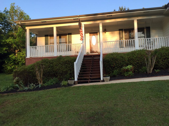 517 Hamlin Road, Unit TRACT Jackson, GA 30233 - Photo 22 of 44 a front view of a house with garden