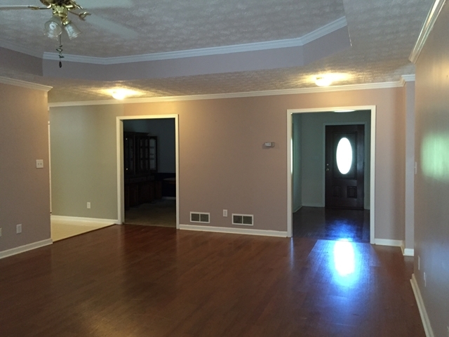 517 Hamlin Road, Unit TRACT Jackson, GA 30233 - Photo 27 of 44 an empty room with wooden floor and windows