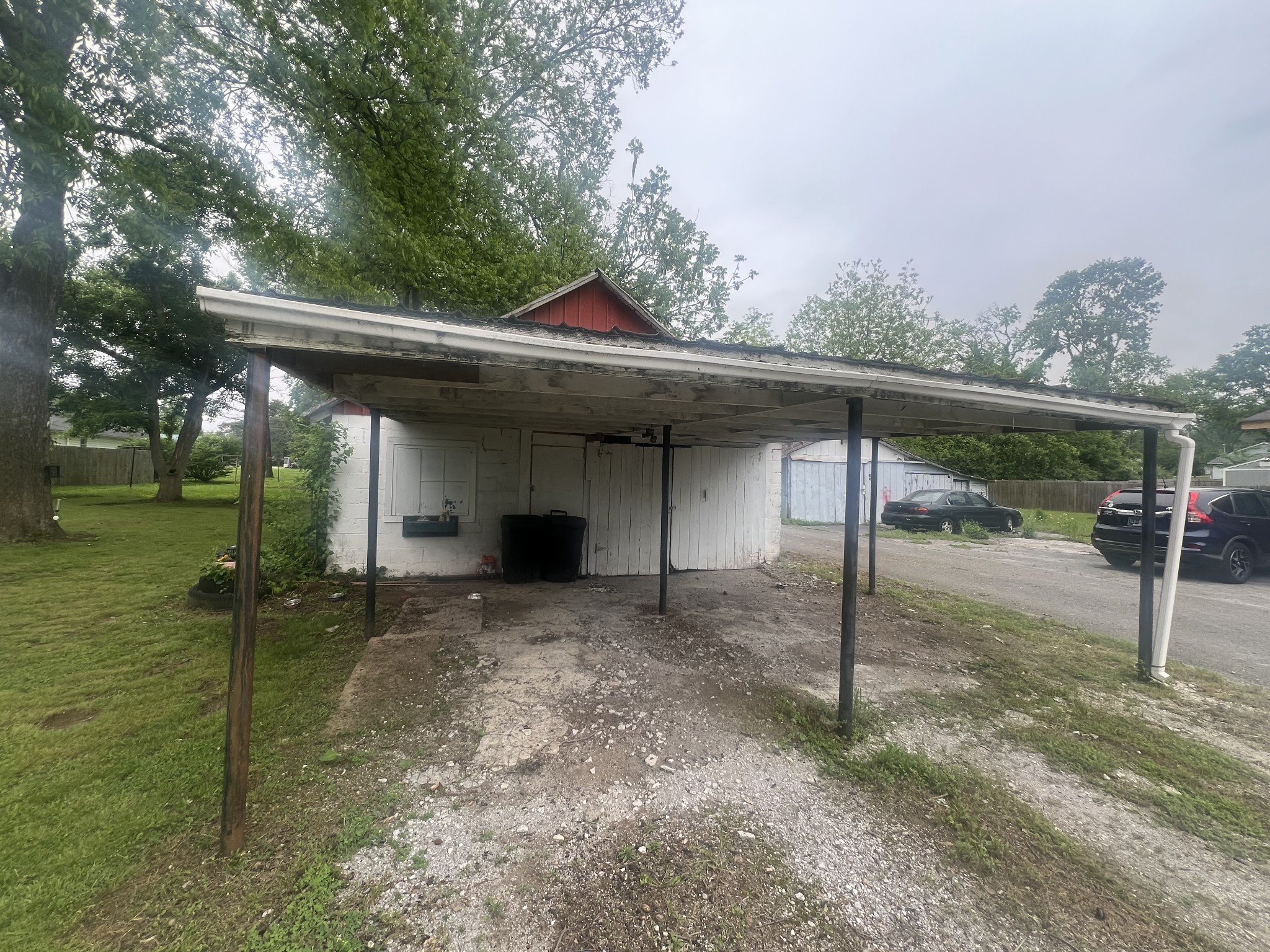 207 Powell Street Decherd, TN 37324 - Photo 6 of 18 a view of a house with a porch