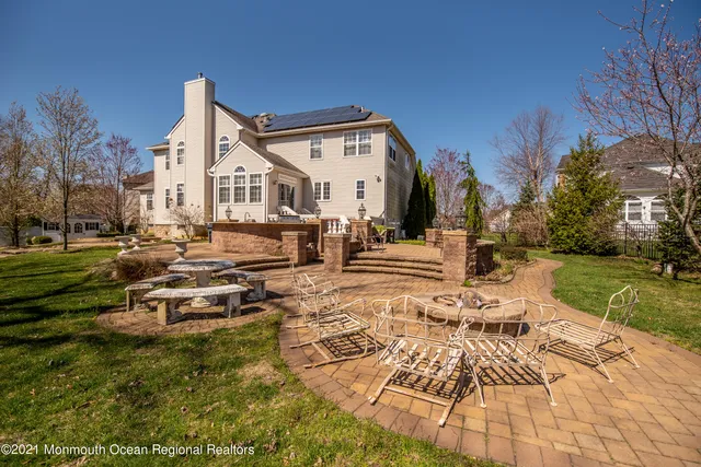 a view of a livingroom with furniture and a rug