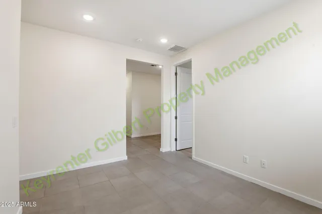 a view of hallway with wooden floor