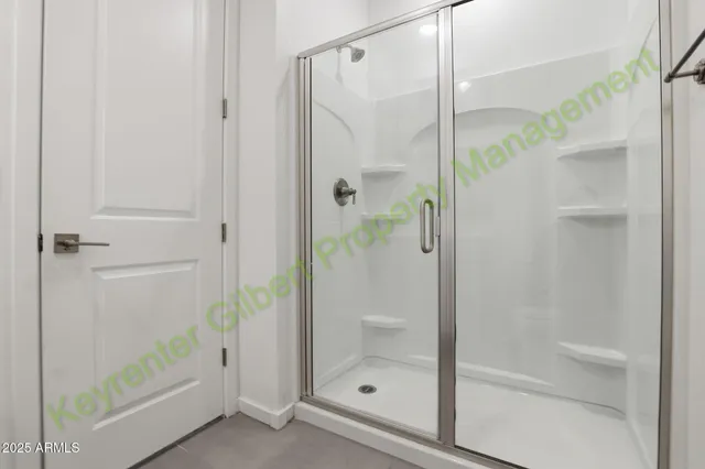 a view of an empty room and wooden floor