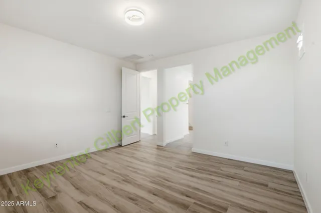 a view of cabinets and tap