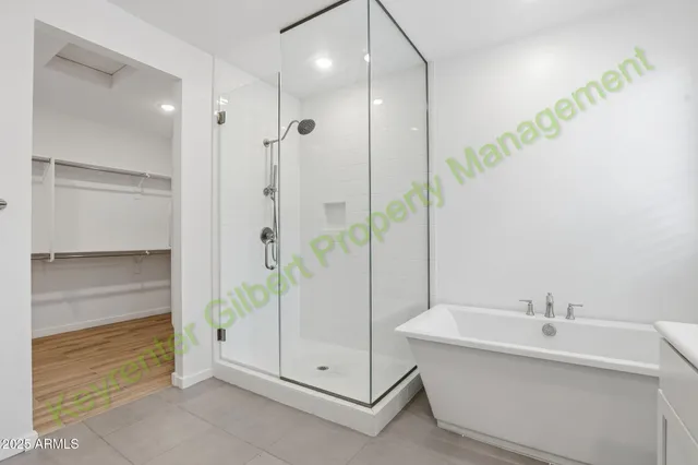 a bathroom with a double vanity sink mirror and double