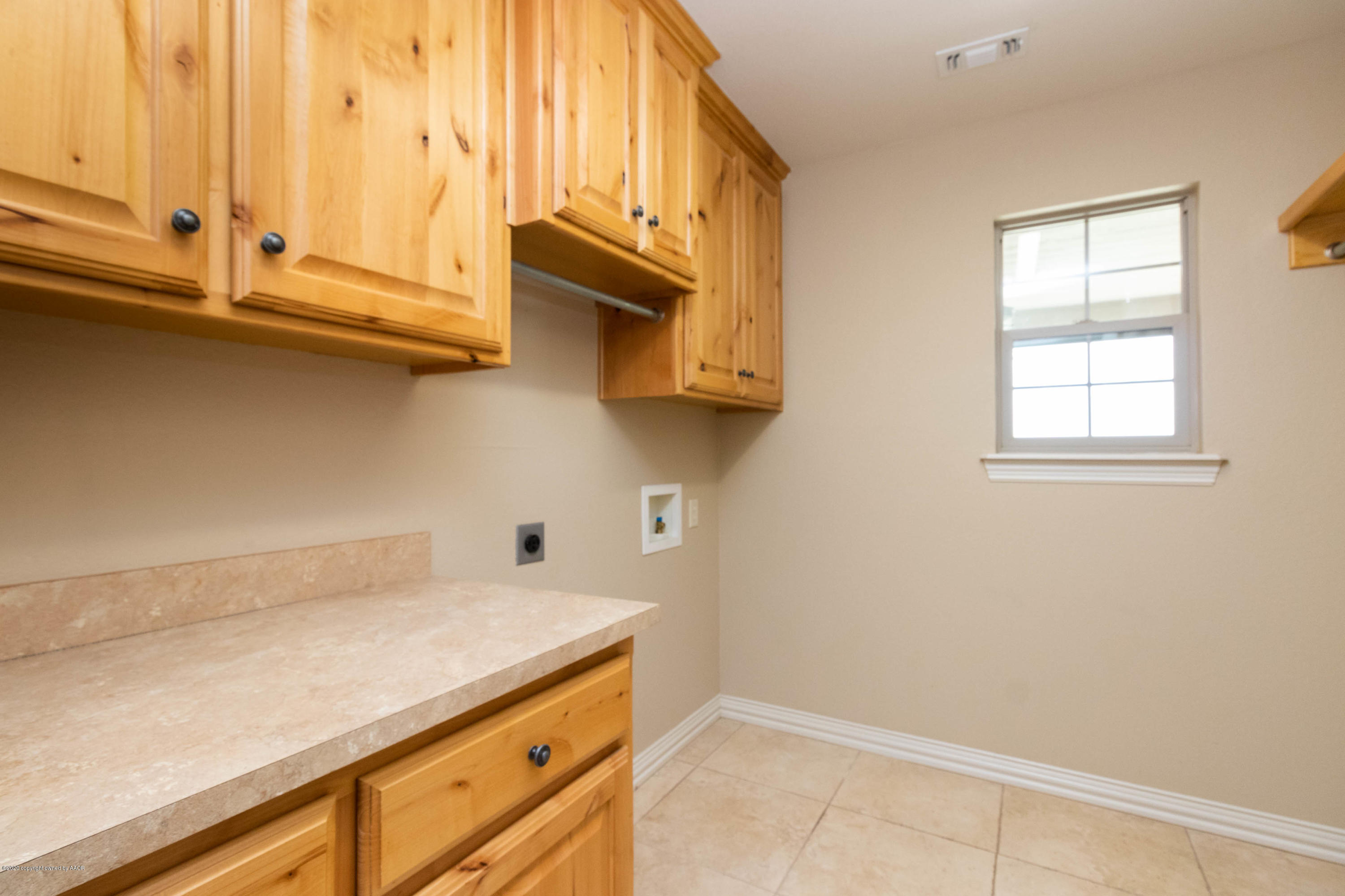 131 Ranch Parkway Canyon, TX 79015 - Photo 18 of 53 a kitchen with a sink and cabinets