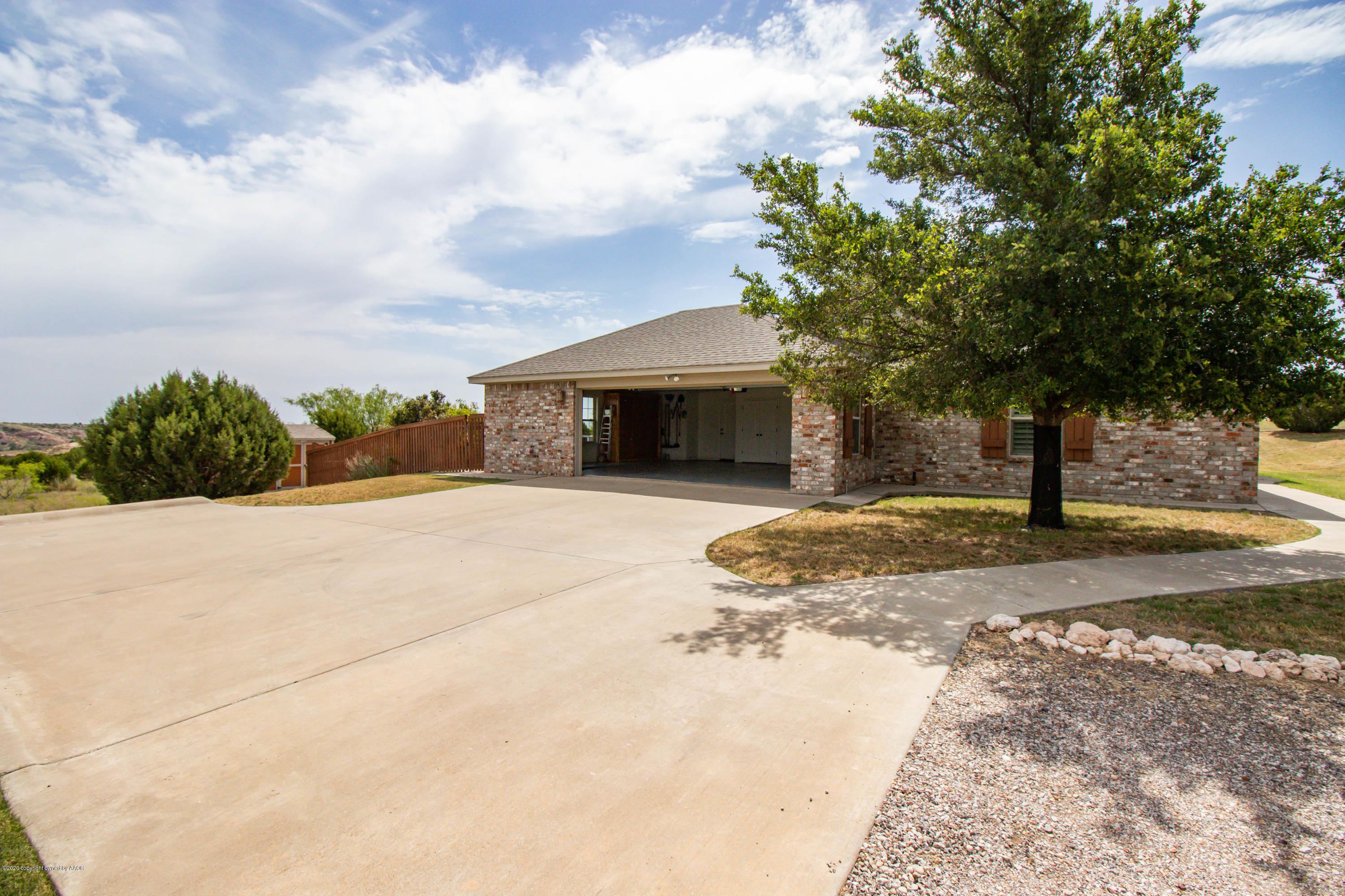 131 Ranch Parkway Canyon, TX 79015 - Photo 52 of 53 a front view of a house with a yard