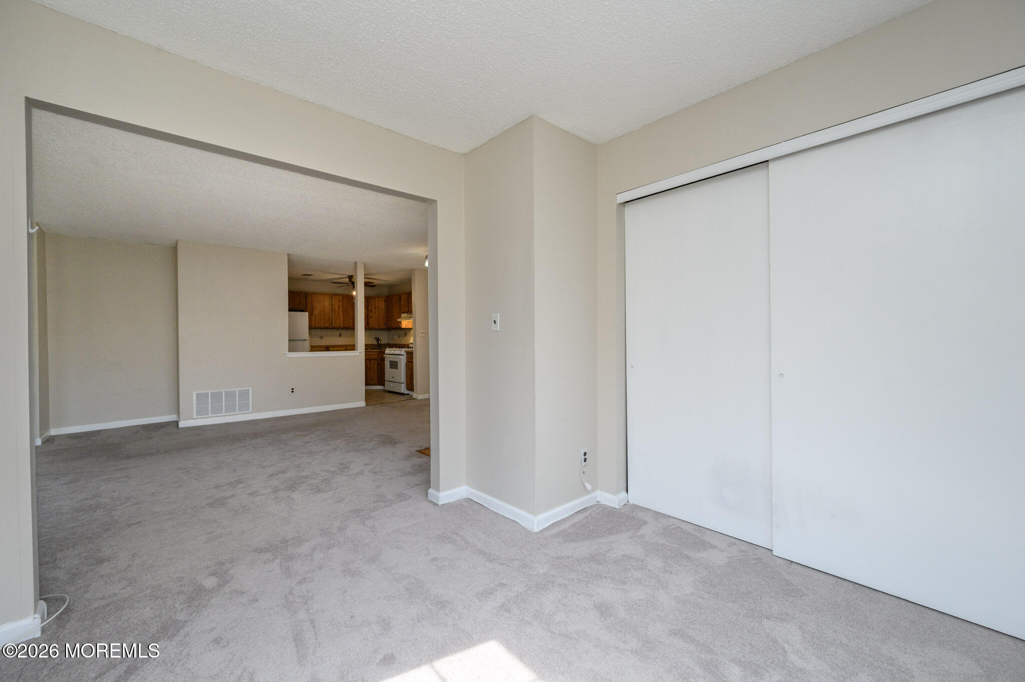 48 Frontier Way Tinton Falls, NJ 07753 - Photo 11 of 25 a view of an empty room with closet and a bathroom