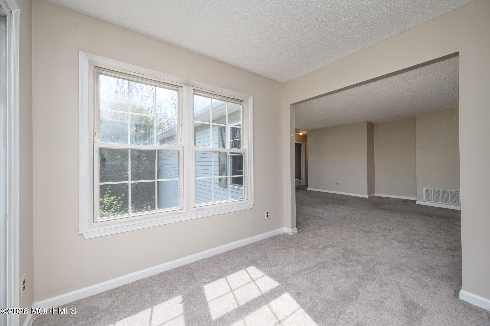 48 Frontier Way Tinton Falls, NJ 07753 - Photo 12 of 25 a view of an empty room with a window